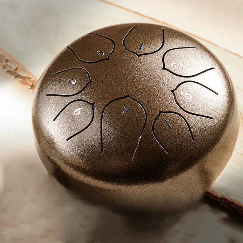 Mini avslappende trommel med integrerte beroligende lyder 